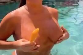 Jenni Neidhart In Pool topless tease boobs